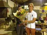 Exchange student Phillip Dahlmann presents flowers to Kate Peal